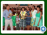 Honour Roll student of CEHS, Valedictorian of the  Class of 2016 & Head Girl, Safyha Bryan, surrounded by her family and the District Supt. Helen Simmons-Johnson - 490A7080