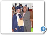 Cordesha Higgs of the SGPAA Class of 2016, receiving a gift from Evangelist Shirley Burrows -490A6562